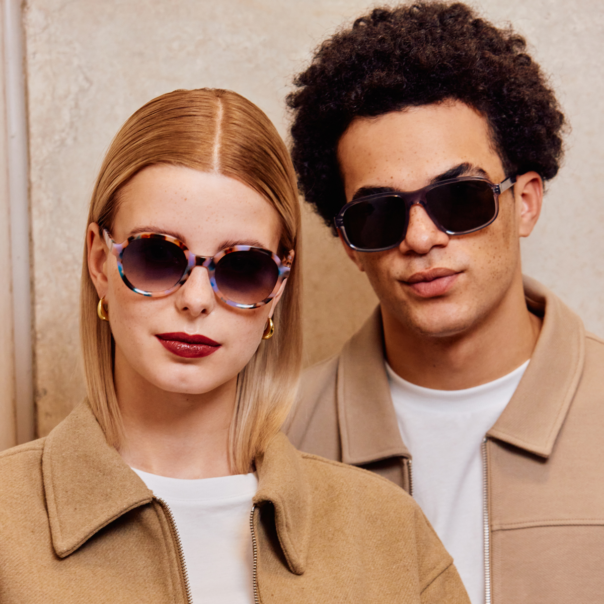 Männliches und weibliches Model tragen FRAIMS Sonnenbrille